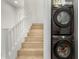 Convenient laundry area next to staircase with new front-load washer and dryer at 4657 S Vapor --, Mesa, AZ 85212