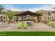 Outdoor community space with tables and chairs, great for entertaining at 4657 S Vapor --, Mesa, AZ 85212