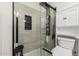 Modern bathroom boasts a large shower with sleek tile and a toilet with bidet at 51089 W Julie Ln, Maricopa, AZ 85139