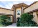 Stunning front exterior showcases the home's unique architecture with manicured landscaping around the entrance at 5450 E Deer Valley Dr # 3023, Phoenix, AZ 85054
