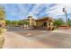 Community gate offers controlled access, with landscaping and well-maintained entrance in a residential area at 5450 E Deer Valley Dr # 3023, Phoenix, AZ 85054