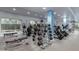 Well-equipped fitness center with various weight machines, treadmills, and a blue accent wall at 5450 E Deer Valley Dr # 3023, Phoenix, AZ 85054