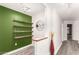 Inviting hallway featuring stylish decor, modern lighting, and wood plank flooring at 5450 E Deer Valley Dr # 3023, Phoenix, AZ 85054