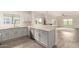 Modern kitchen with stainless steel appliances and bar stool seating that opens to living area at 5450 E Deer Valley Dr # 3023, Phoenix, AZ 85054