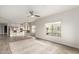 Open concept living room with a view of the kitchen and natural light at 5450 E Deer Valley Dr # 3023, Phoenix, AZ 85054