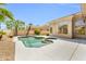 A backyard features a pool with a jacuzzi at 6041 E Hartford Ave, Scottsdale, AZ 85254