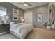 Cozy bedroom featuring a ceiling fan, neutral walls, and carpet for a warm and inviting atmosphere at 6091 N Sunrise Ln, Buckeye, AZ 85396