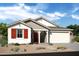 Charming single-Gathering home with a two-car garage, red shutters, and low-maintenance landscaping at 6091 N Sunrise Ln, Buckeye, AZ 85396