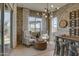 Inviting sitting area with comfortable seating, stylish decor, and ample natural light creating a cozy space at 6091 N Sunrise Ln, Buckeye, AZ 85396