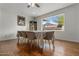 Dining room with a large picture window, hardwood floors, and mountain views, perfect for Gathering dinners at 6912 N 19Th St, Phoenix, AZ 85016