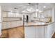 Spacious kitchen boasts stainless steel appliances, granite countertops, and ample cabinet space at 6912 N 19Th St, Phoenix, AZ 85016