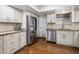 Well-appointed kitchen features stainless steel appliances, light wood cabinetry, and ample counter space at 6912 N 19Th St, Phoenix, AZ 85016