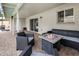 Covered patio featuring an outdoor seating area with a fire pit, perfect for relaxing evenings at 6912 N 19Th St, Phoenix, AZ 85016