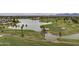 Scenic aerial view of the golf course and lake at the property at 7275 N Scottsdale Rd # 1001, Paradise Valley, AZ 85253