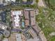An overhead shot of the property showcases community layout, pool, and lush surroundings at 7275 N Scottsdale Rd # 1001, Paradise Valley, AZ 85253