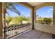 Balcony with palm tree view and black decorative railings at 7275 N Scottsdale Rd # 1001, Paradise Valley, AZ 85253