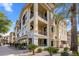 Exterior of the property with stucco, stone accents, and a private balcony at 7275 N Scottsdale Rd # 1001, Paradise Valley, AZ 85253