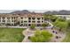 Beautiful condominium complex with well-maintained landscaping and mountain views at 7275 N Scottsdale Rd # 1001, Paradise Valley, AZ 85253