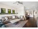 Spacious living room with hardwood floors, comfortable seating, and chandelier at 7275 N Scottsdale Rd # 1001, Paradise Valley, AZ 85253