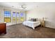Spacious main bedroom featuring golf course view and a ceiling fan at 7275 N Scottsdale Rd # 1001, Paradise Valley, AZ 85253