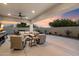 Backyard area with covered patio, seating, and desert landscaping at 8817 S 18Th Way, Phoenix, AZ 85042
