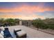 Outdoor balcony featuring seating with sunset views at 8817 S 18Th Way, Phoenix, AZ 85042