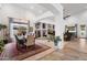 Open concept dining and living room featuring tile flooring, high ceilings, and neutral paint at 8817 S 18Th Way, Phoenix, AZ 85042