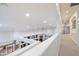 Open interior view with fireplace, high ceilings, recessed lighting, and staircase at 8817 S 18Th Way, Phoenix, AZ 85042
