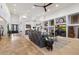 Bright and airy living room featuring a built-in entertainment center and open concept floor plan at 8817 S 18Th Way, Phoenix, AZ 85042