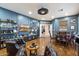 Living room showcasing stylish blue walls, hardwood floors, and comfortable leather seating at 8817 S 18Th Way, Phoenix, AZ 85042