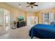 A large main bedroom with TV, closet, and ensuite at 8817 S 18Th Way, Phoenix, AZ 85042