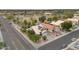 A wide aerial view shows a beautiful two-story home and the surrounding neighborhood at 9509 W Tonopah Dr, Peoria, AZ 85382