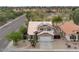 A charming two-story home featuring desert landscaping, a two-car garage and solar panels on the roof in quiet neighborhood at 9509 W Tonopah Dr, Peoria, AZ 85382
