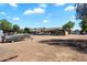 Expansive backyard featuring a boat, covered patio, and mountain views, perfect for outdoor living at 9722 W Prospector Dr, Queen Creek, AZ 85144