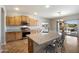 Bright kitchen with granite countertops, modern appliances, and a large island at 9722 W Prospector Dr, Queen Creek, AZ 85144