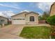 Charming single-story home with a well-maintained lawn and desert landscaping in front yard at 9834 E Fairview Ave, Mesa, AZ 85208