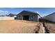 The backyard features a patio, perfect for outdoor entertaining and relaxation at 15790 W Cheryl Dr, Waddell, AZ 85355