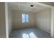 Spacious unfinished room with large window and great natural light at 15790 W Cheryl Dr, Waddell, AZ 85355