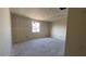 Bedroom with natural light, ready for personalization at 15790 W Cheryl Dr, Waddell, AZ 85355