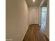 Bright entryway featuring wood-look tile flooring and a neutral color palette, perfect for any decor at 15790 W Cheryl Dr, Waddell, AZ 85355