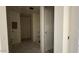 Hallway showcasing potential for storage and customization at 15790 W Cheryl Dr, Waddell, AZ 85355