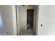 Hallway leading to a closet and other rooms in this new construction home at 15790 W Cheryl Dr, Waddell, AZ 85355