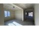 View of the living room of a new construction home with open floorplan at 15790 W Cheryl Dr, Waddell, AZ 85355