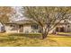 Charming single-story home with a well-manicured front yard and mature landscaping at 2823 N 69Th Pl, Scottsdale, AZ 85257