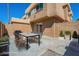 Outdoor patio area with a dining table, perfect for entertaining and enjoying the fresh air at 4614 E Pueblo Ave, Phoenix, AZ 85040