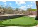 Enjoy the outdoors with the private putting green in this well maintained property at 11451 E Christmas Cholla Dr, Scottsdale, AZ 85255