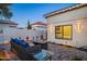 Inviting backyard patio features a cozy fire pit and comfortable seating, perfect for outdoor entertaining at 11977 N 81St St, Scottsdale, AZ 85260