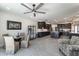 Bright dining area next to the gourmet kitchen, complete with a stylish table and seating at 11977 N 81St St, Scottsdale, AZ 85260