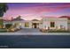 Modern home with desert landscaping and well-lit walkway at 11977 N 81St St, Scottsdale, AZ 85260