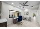 Bright office space boasts a large window, stylish furnishings, and views of the outdoor courtyard at 11977 N 81St St, Scottsdale, AZ 85260